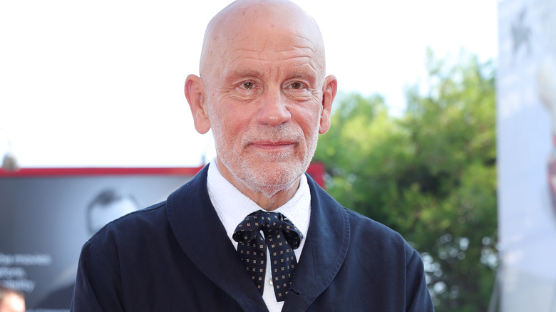 Malkovich in a suit