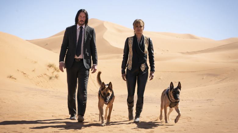 Halle Berry in "John Wick 3" with Keanu Reeves and dogs