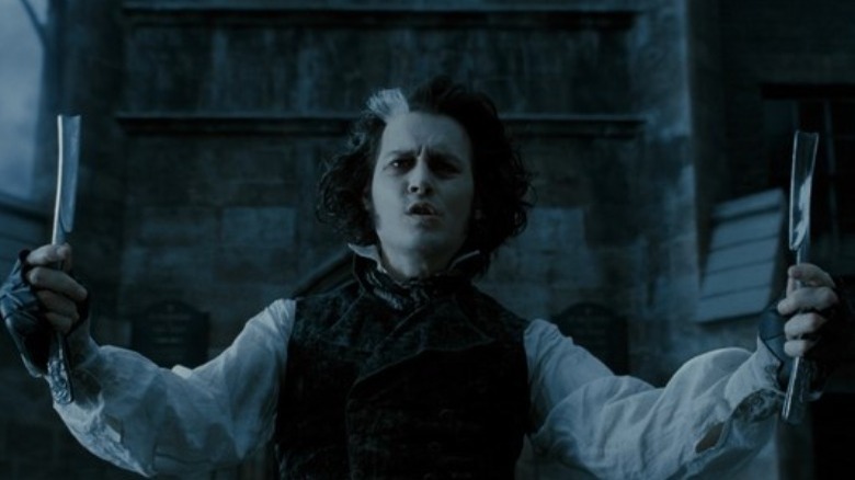 Sweeney Todd holding blades