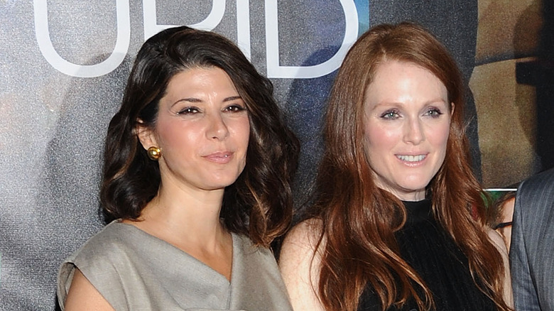 Marisa Tomei and Julianne Moore smile on red carpet