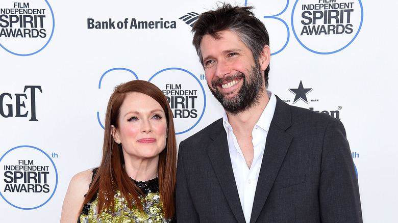 Julianne Moore and Bart Freundlich smile on red carpet