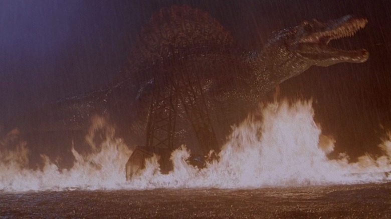 The Spinosaurus getting frightened by fire