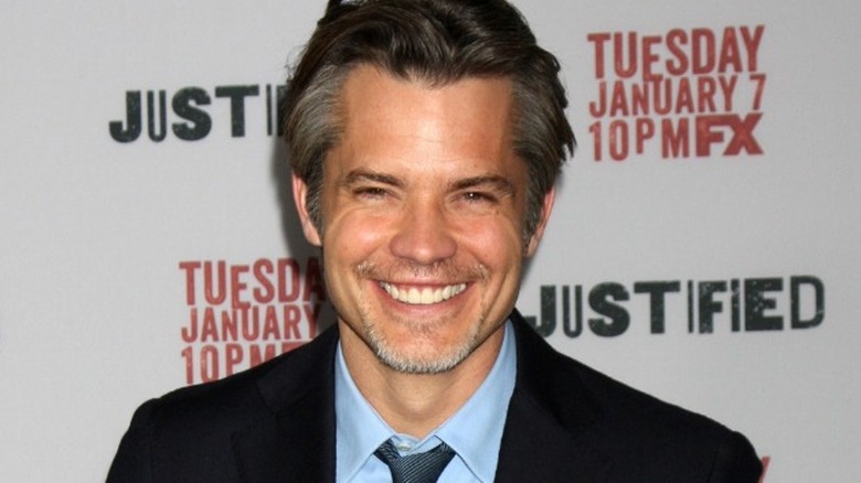 Timothy Olyphant smiles at Justified premiere