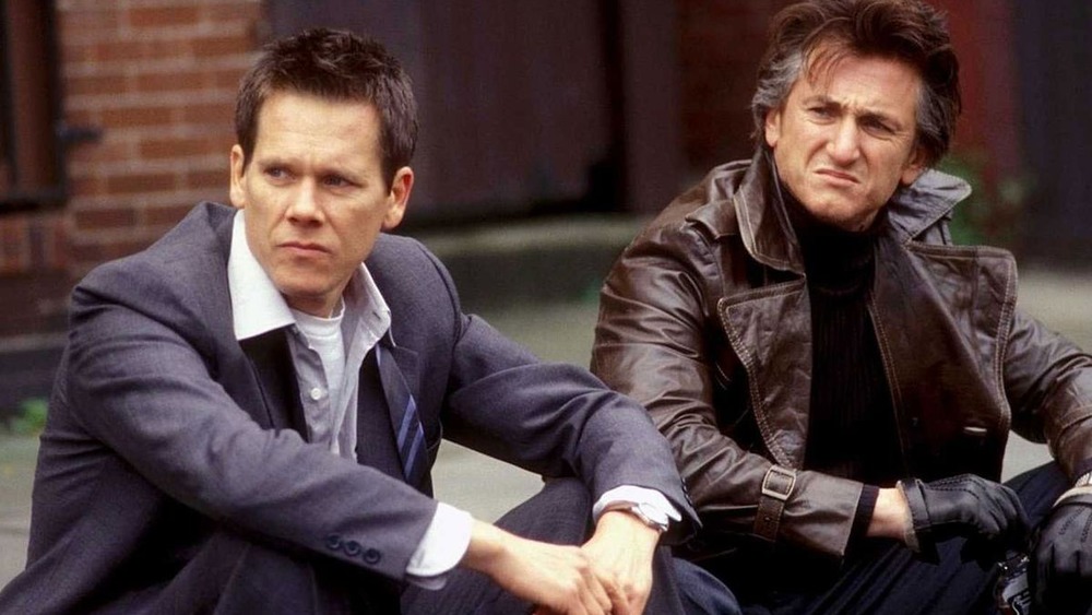 Kevin Bacon as Detective Sean Devine and Sean Penn as James "Jimmy" Markum in Mystic River