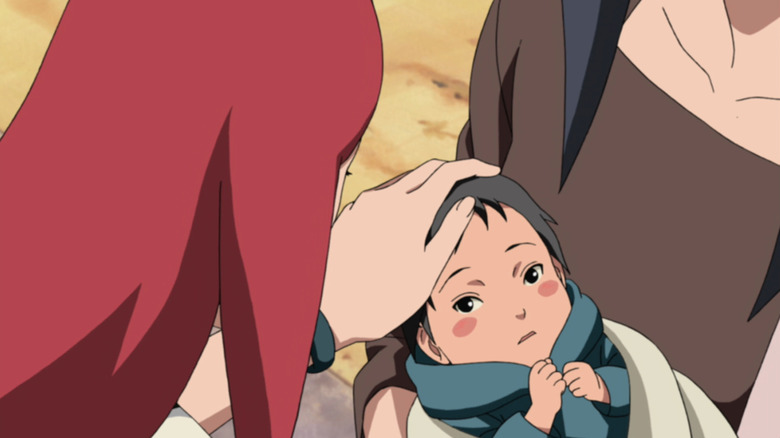 Kushina stroking baby Sasuke