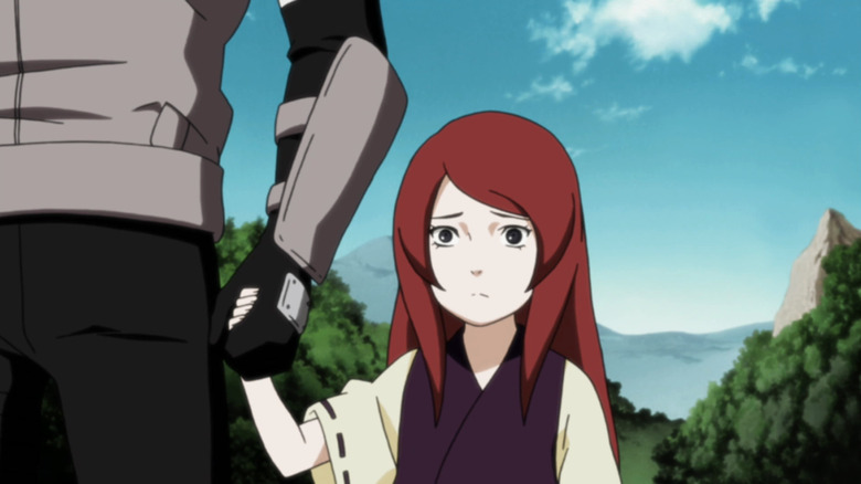 Kushina holding a ninja's hand