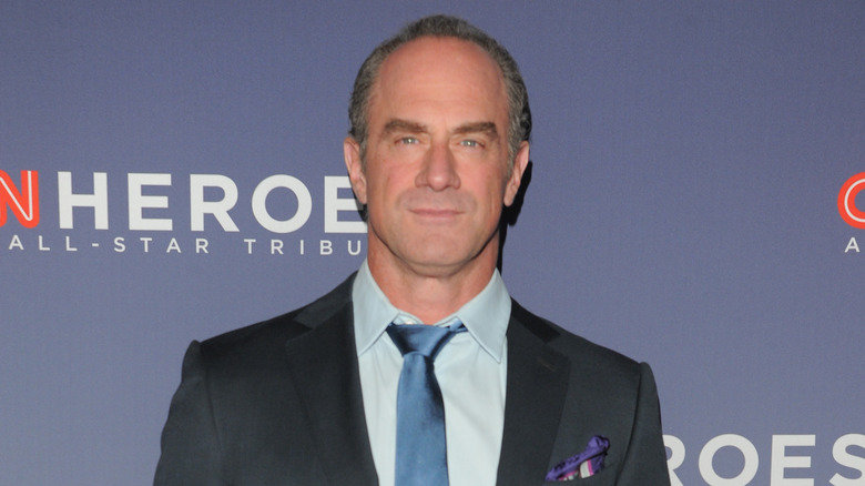 Christopher Meloni wearing gray suit