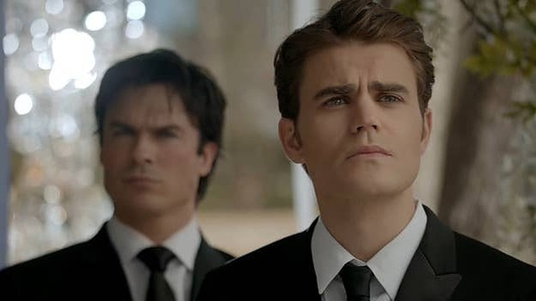 Damon and Stefan scowling