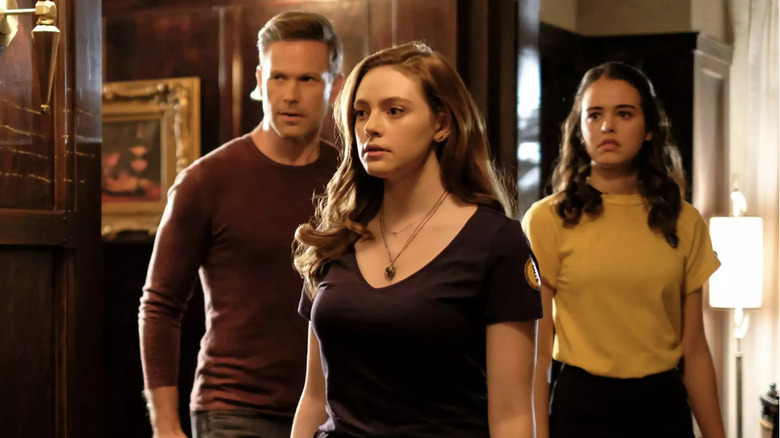 Alaric, Hope, and Josie look intense