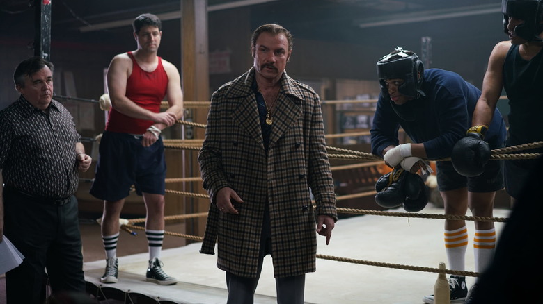 Liev Schreiber stands outside ring