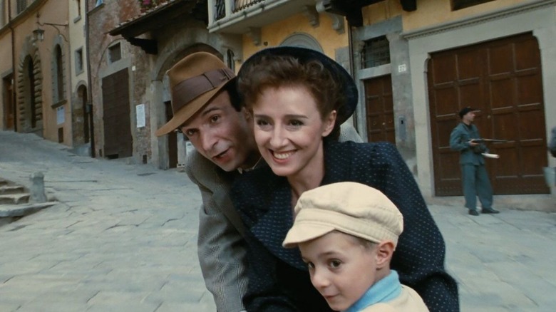 Guido and family ride a bike