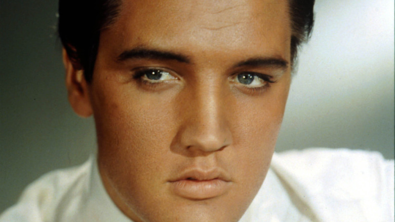 Elvis Presley in a white shirt