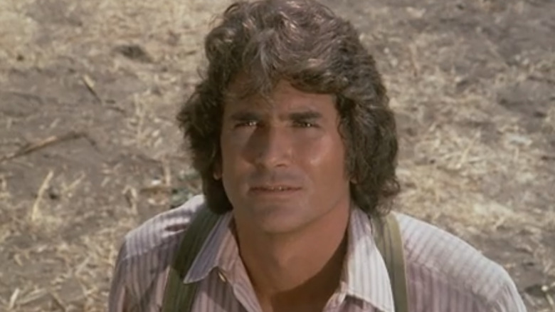 Charles Ingalls standing outside