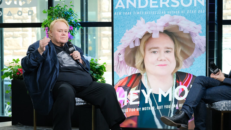 Louie Anderson sitting