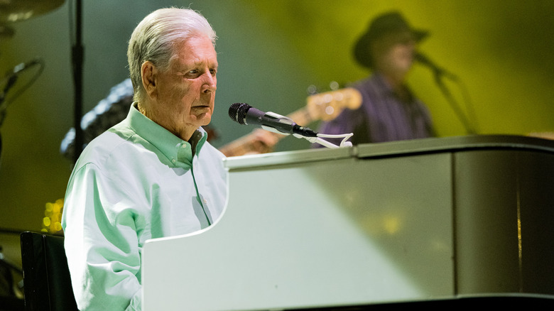 Brian Wilson with a microphone