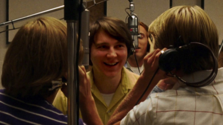 Paul Dano singing and laughing