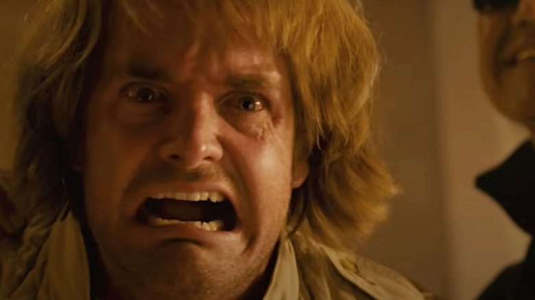 MacGruber grimaces in anguish