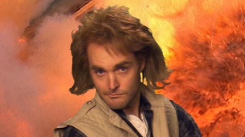 MacGruber poses in front of an explosion