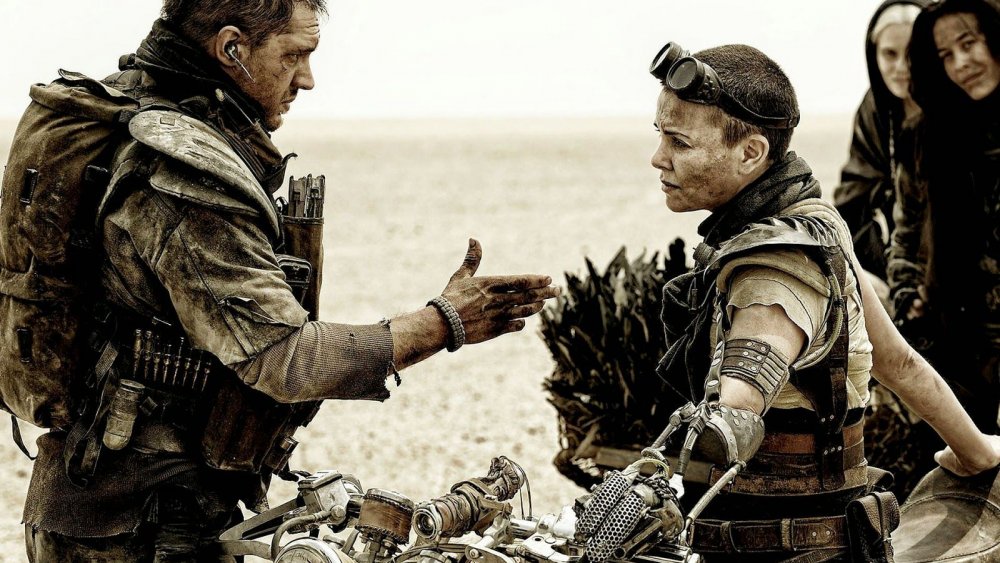 Charlize Theron as Furiosa and Tom Hardy as Max in Mad Max: Fury Road