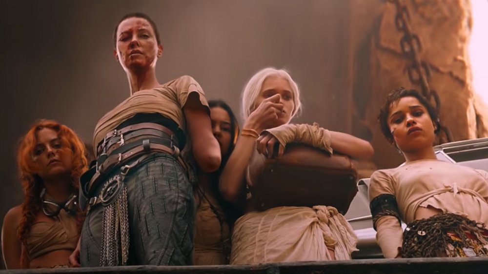 Charlize Theron as Furiosa and Immortan Joe's wives in Mad Max: Fury Road