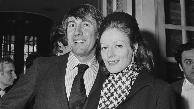 Maggie Smith with husband, both smiling