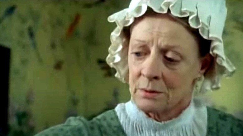 Maggie Smith looking down