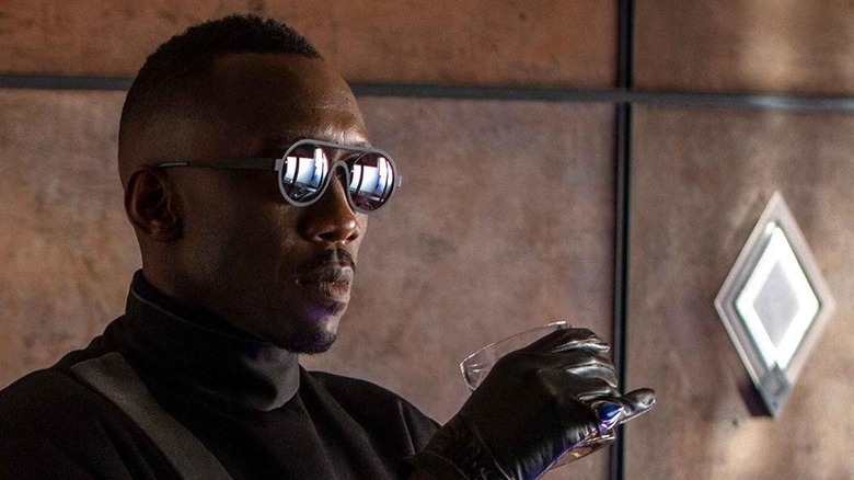 Mahershala Ali Holding Glass