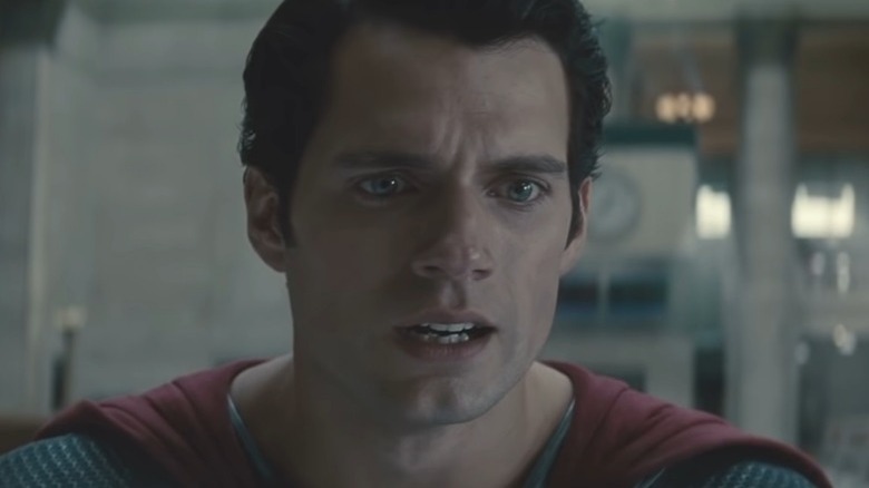 Sad Superman looks in horror