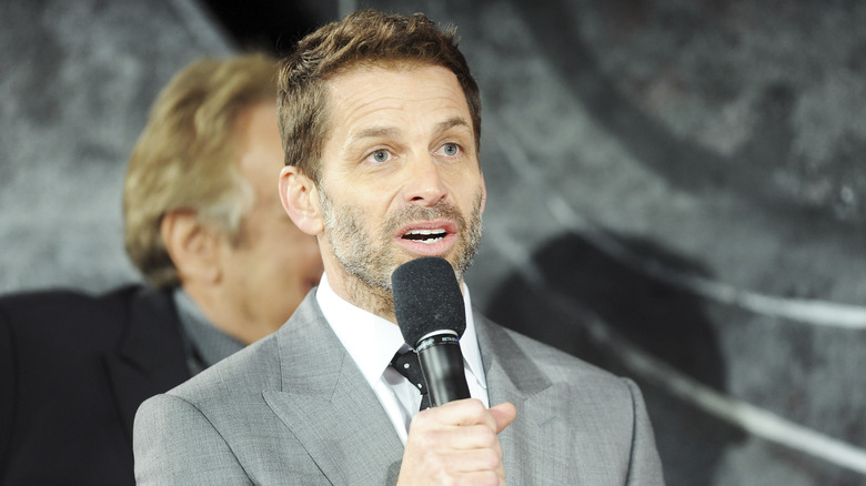 Zack Snyder speaking on the mic