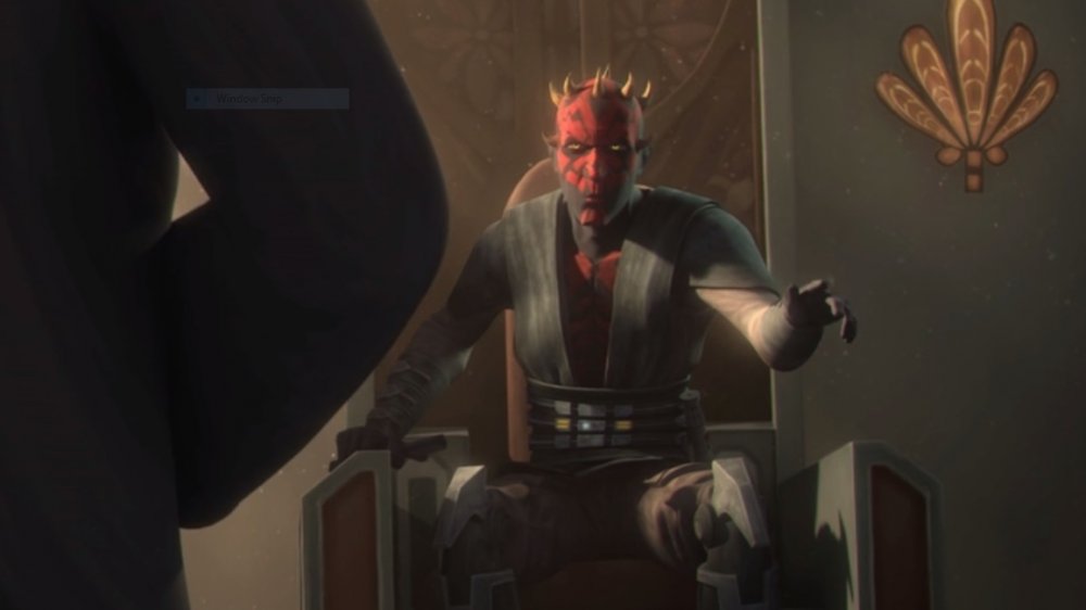 Maul sits on the Mandalorian throne