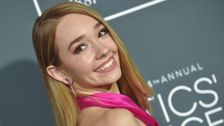 Holly Taylor smiling on red carpet