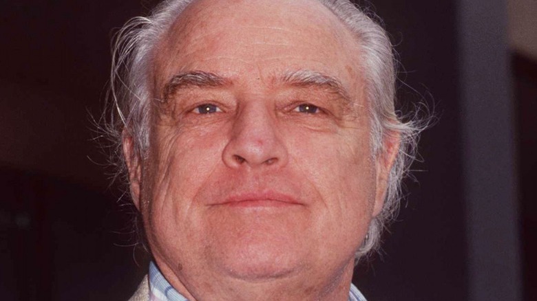 Marlon Brando closed lip smile