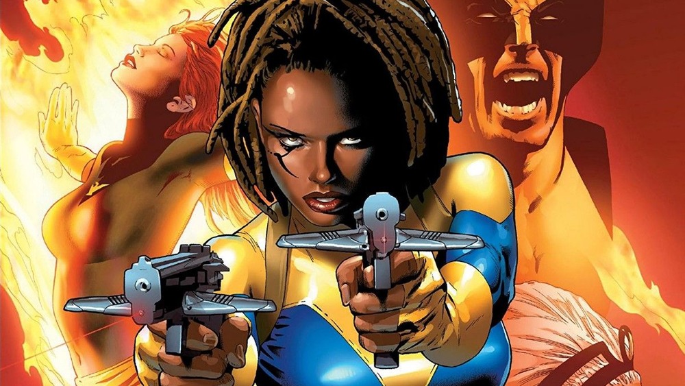 Aliyah Bishop aiming pistols