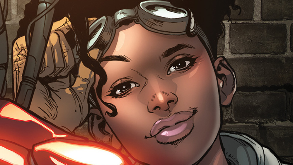 Riri Williams/Ironheart lifts her goggles