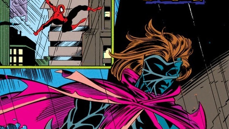 Kaine watches Spider-Man swinging