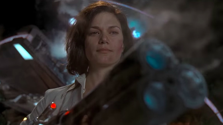 Dr. Laurel Weaver holds blaster