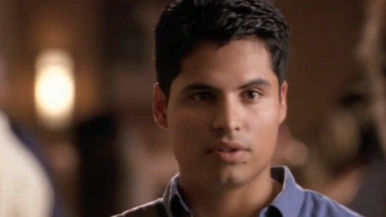 Michael Pena in hall in Felicity