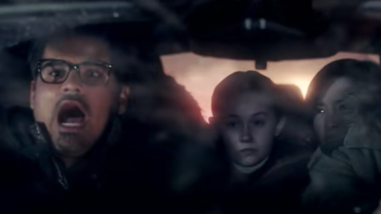 Michael Pena screams in car with children in Moonfall