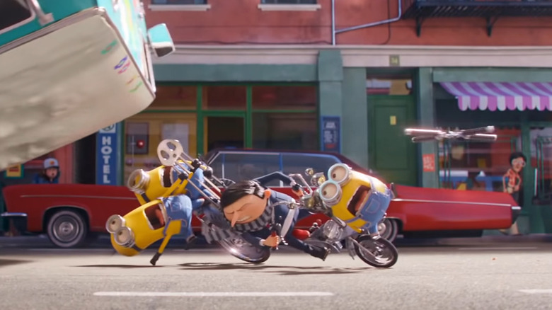 Young Gru and Minions being chased on motorcycle