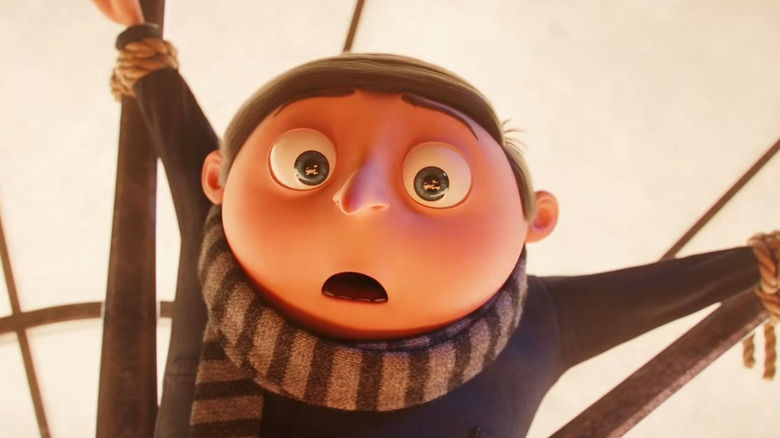 Young Gru tied to a clock