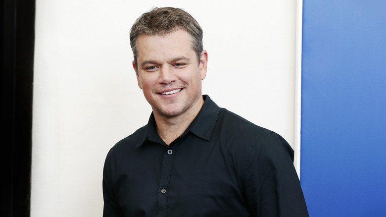 Matt Damon smiles on red carpet