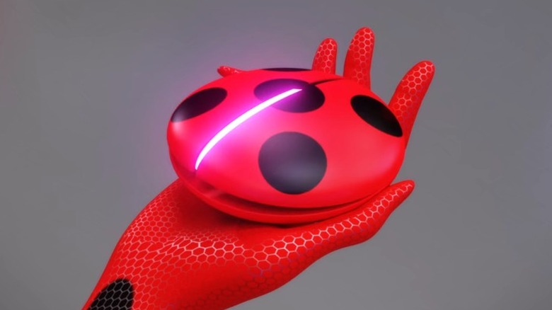 Ladybug holds her yo-yo