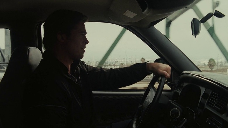 Brad Pitt driving away