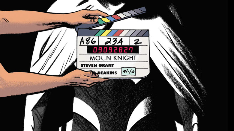 Clapboard in front of moon knight