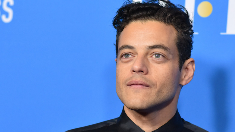 Rami Malek posing