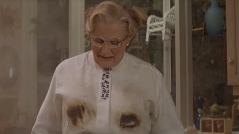 Mrs. Doubtfire wearing burned dress