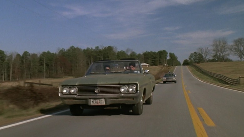 Mitchell Whitfield as Stan Rothenstein and Ralph Macchio as Bill Gambini being pulled over in the Buick Skylark in My Cousin Vinny