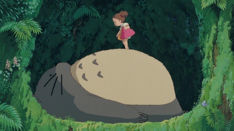 Mei standing on Totoro's stomach