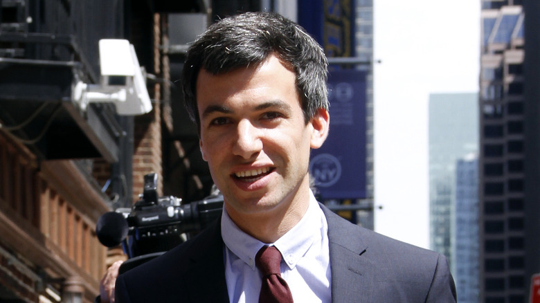 Nathan Fielder on sidewalk