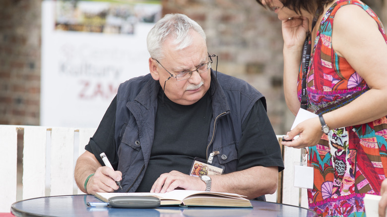 Andrzej Sapkowski signing books